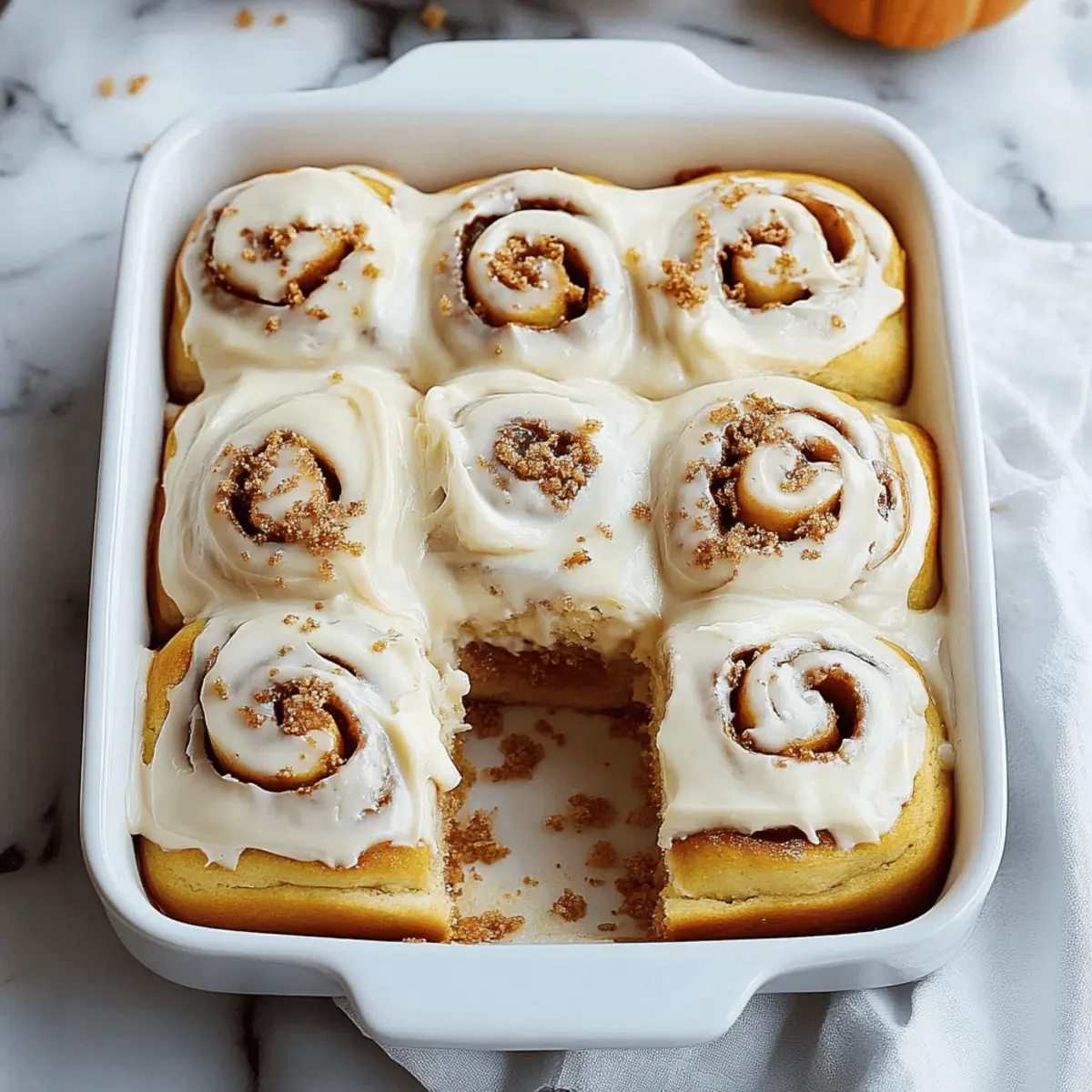 Pumpkin Cinnamon Rolls with Cream Cheese Maple Frosting